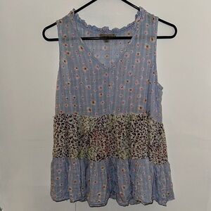 Wonderly Purple Ruffled Sleeveless Blouse
